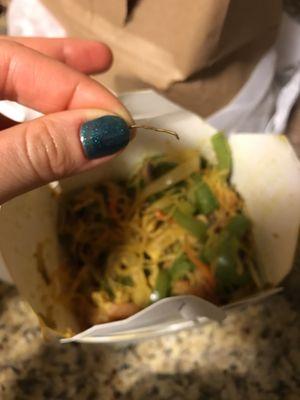 Look what I found in a Singapore noodles - little metal wire.. first time ordered from this place, and already disappointed ...