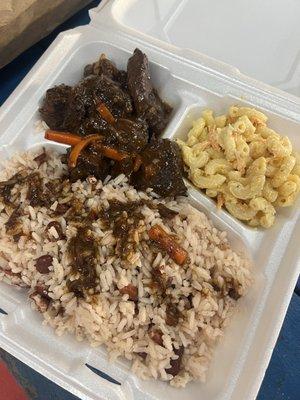 beef stew, served over rice & beans with macaroni salad