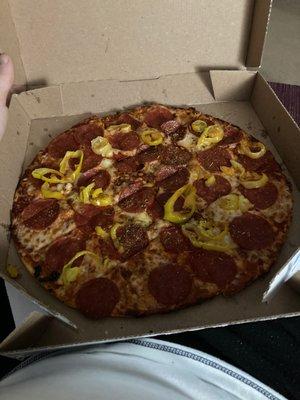 Thin crust pepperoni and banana peppers it's actually crispy the way thin crust pizza should be!