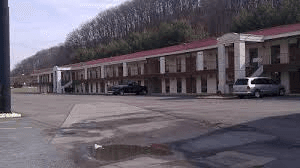 This is a long-shot of the American Inn, Bristol, Tennessee, as seen traveling north on I-81.