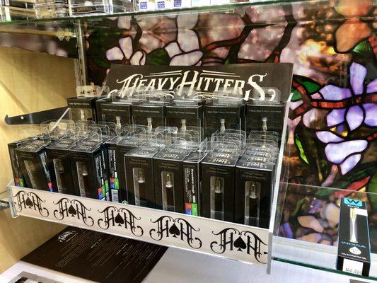 Heavy Hitters display of disposable vape pens.