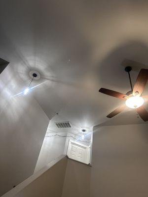 Lighting replaced over stairs and new ceiling fan installed.