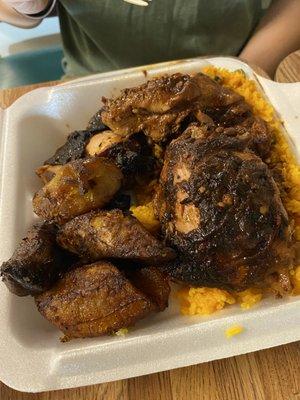 Jerk chicken lunch plate with yellow rice & plantains