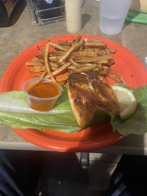 Salmon with Fresh cut fries. My other side was a fresh Caesar salad.