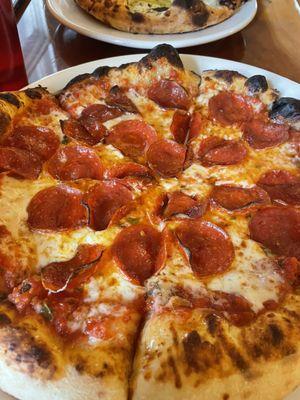 Custom made pepperoni pizza with honey!