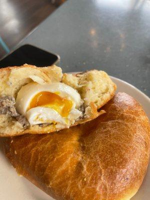 A savory stuffed bread with sausage and egg and yummy