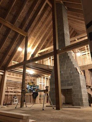 Large exposed chimney/fireplace in our lake house project