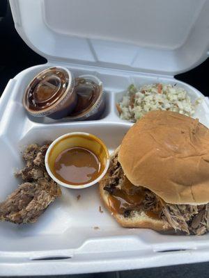 Pulled Pork Sandwich With Coleslaw on the side. Btw this was my first time ever trying coleslaw and I actually like it.