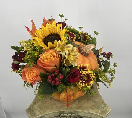 Orange pumkin centerpiece