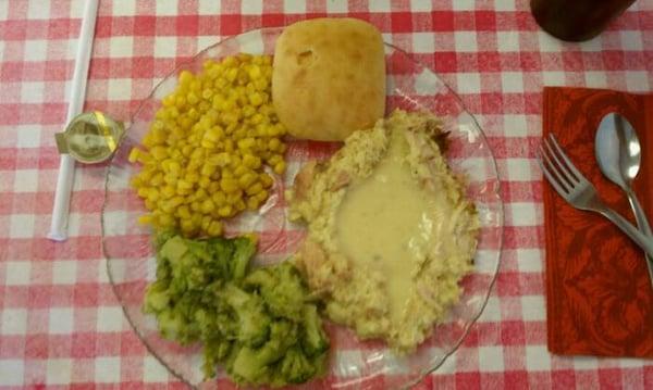 Chicken & dressin', broccoli, corn, & a roll.