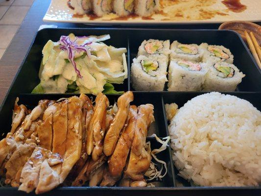 Teriyaki bento box with California roll