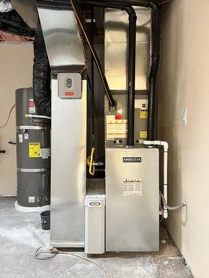 Gas furnace and high efficiency heat pump with 10.5 HSPF. In addition, the 2-zone system maintains an individual temperature on each floor.