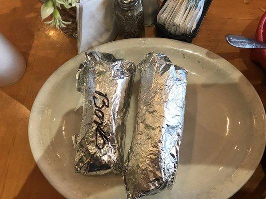 Barbacoa taco and potato taco.