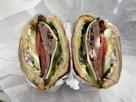 Roast beef sandwich with a croissant