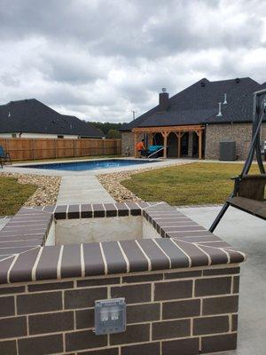 Completed pool and firepit area.