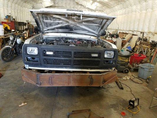 The front end of a soon to be service truck