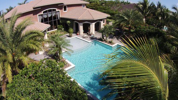 Outdoor seating area, fire pit, outdoor kitchen, travertine, trellis, Works in Hollywood, Davie, Weston, Southwest Ranches, Fort Lauderdale