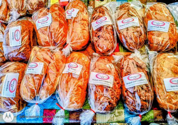 Bought: Raisin Bread & Walnut Cranberry Bread. The always impressive Daily Kneads Brick Oven Breads by John.