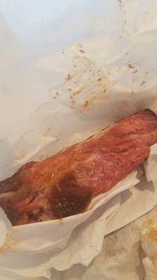 RAW RIB MEAT underneath the outside layer. UNDONE. Save your money...and go somewhere else!