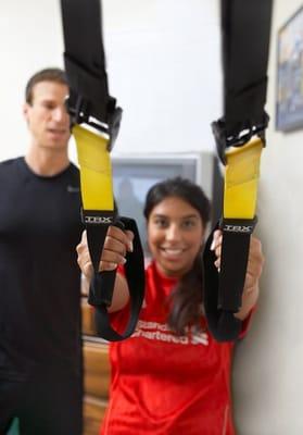 TRX Suspension Training utilizes your body-weight as the resistance.  The TRX works the core, balance, and your whole body!