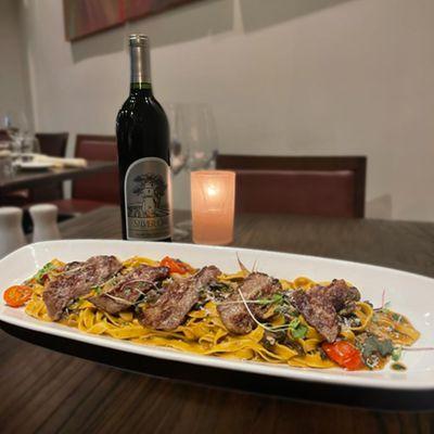 Try our Chef's Special: N.Y. Strip Steak with Fettuccine ai funghi