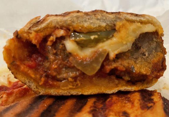 Pressed meatball grinder inside view