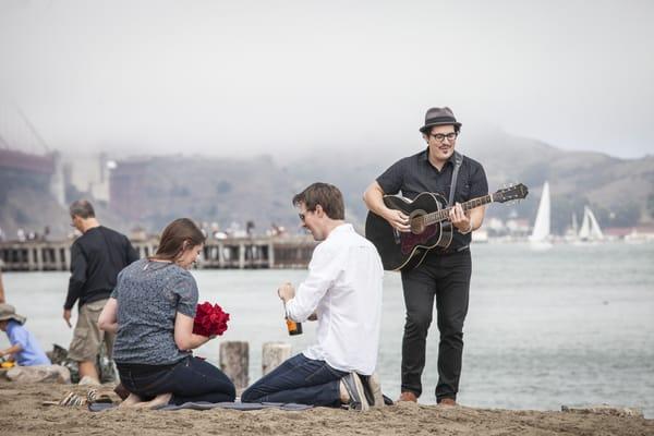 David's scenic San Francisco proposal.  See the package he used: https://www.paparazzi-proposals.com/product/picturesque-park-proposal-4/