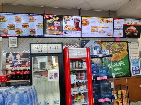 Carl's Jr. menu above the Circle K merchandise