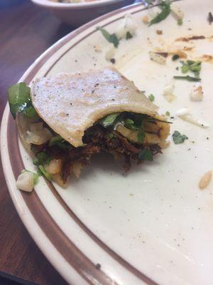 The last bite of my street taco. I was eating while writing my yelp review and they were so good I forgot to take a pic of the tacos.