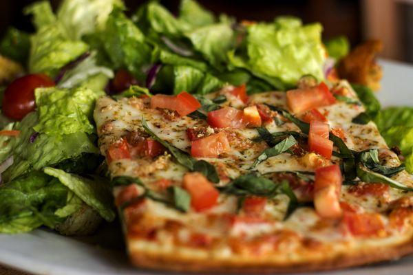 Slice and a Salad for just $6.95 during lunch and Fire Hours!