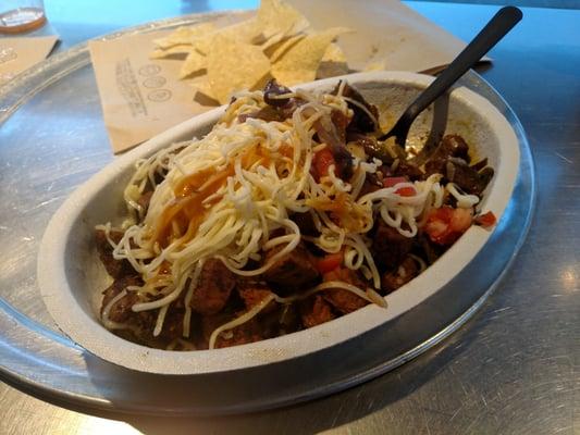 Bowl, extra steak, brown rice, peppers and onions, salsa, cheese