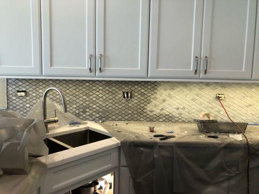 It was scary to see what wet grout did to the backsplash appearance, but it dried beautifully to the intended color.