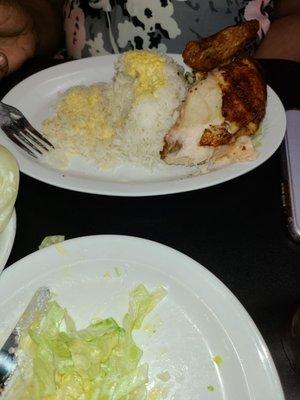 1/4 quarter of roasted chicken, rice an salad