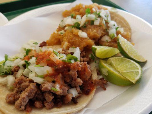 taquitos: uno de asada con todo y uno de chicharron en salsa. Just posting this picture, makes me wanna go back for more.