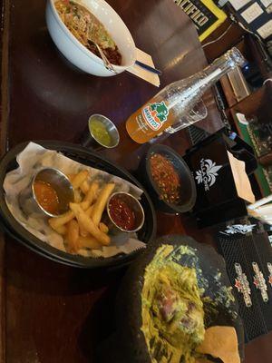 Guacamole Molcajete and burrito bowl.