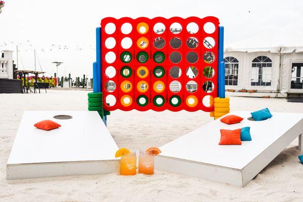 Beach games: connect four, corn hole, ping pong, etc.