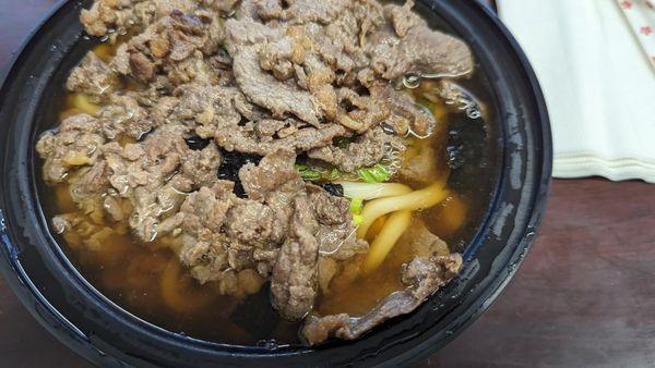 Udon Noodle Soup
 
 Thick wheat noodles served in a savory broth with mushrooms. Topped with nori and scallions - added the Bulgogi