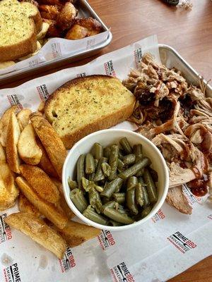 Combination Platter: I got Pulled Pork, Cajun Potato Wedges & Green Beans, plus a beautiful buttery slice of Texas Toast!