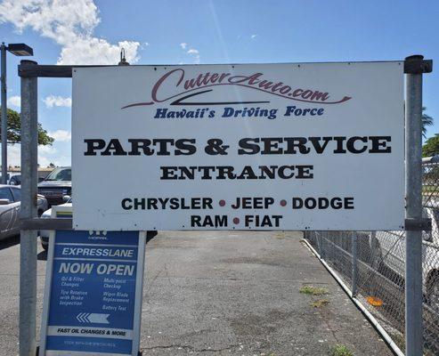 As you enter the service dept. you will see this sign by the gate.