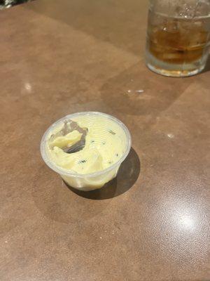 Garlic butter served with bread for the table