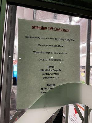 Sign on the door with the info that contradicts the hours stated on their location phone message for customers.