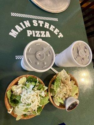 Main Street green tables with our drinks and salads