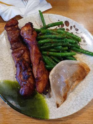 Teriyaki Chicken, String Beans and a pork dumpling.