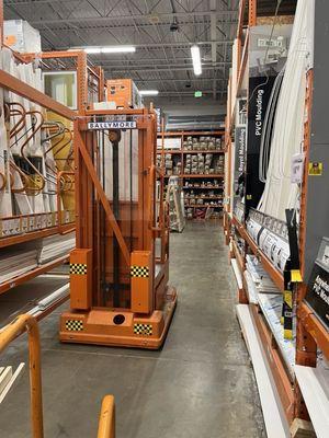 Let's leave a forklift in the middle so the carts can't get through. Couldn't get a regular cart through here.