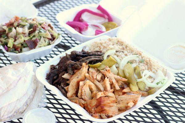 Shawarma combo ($17.95) - 1/2 chicken and 1/2 shawarma (comes w/ rice and salad). Super dry :(