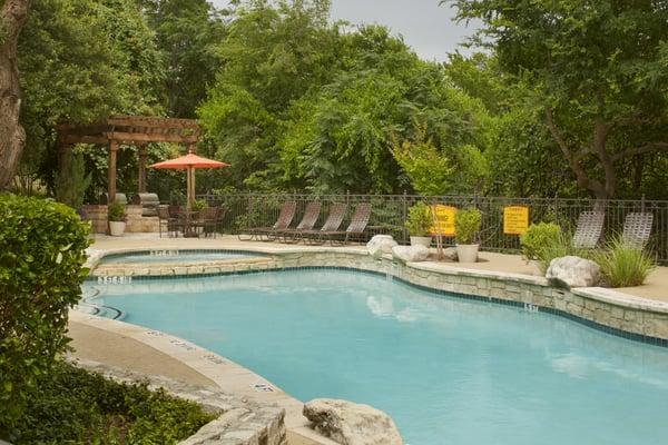 Gorgeous resort style swimming pool is the perfect place to go for a dip or lounge around