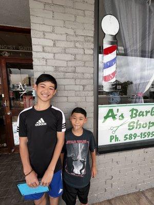 Boys liked their haircuts from A's Barbershop stylists!