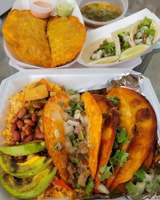 Front: Birria Tacos (Carne Asada).  Top left:  Empanadas. Top right: Street Tacos (Carne Asada).