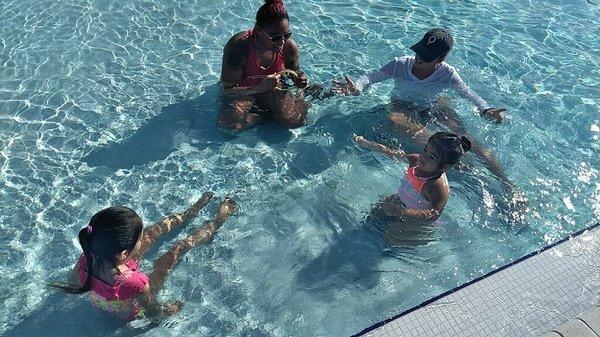 Here's a local family learning how to swim at the Rec Dept, thanks to a $50 Sunshine Laundries' Swim Scholarship.