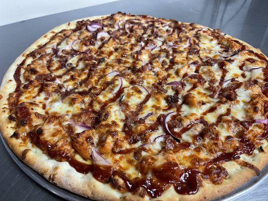 BBQ Chicken Pizza (cheese, chicken, bacon, red onion, and bbq sauce)